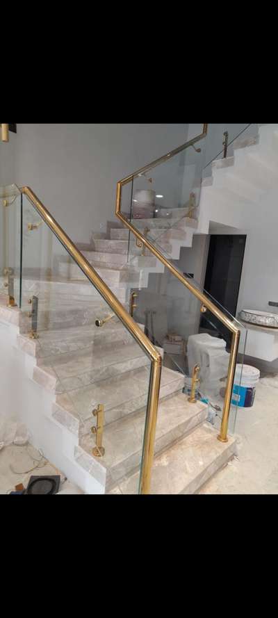 staircase PVD gold glass Railings.
.
.
.
.
.
.
.#railings #railing #glass #interiordesign #design #welding #architecture #railingtangga #stairs #railingbalkon #railingstainless #construction #staircase #railingtanggaminimalis #railingstainlessteel #railingkaca #glassrailing #railingkayu #railingminimalis #steel #railingsurabaya #railingmurah #railingcustom #loncengtiang #railingsidoarjo #gates #railingtanggakacatempered #handrail #aksesorisrailingtangga #knopkaca