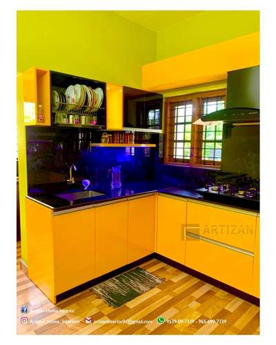 modular kitchen 1.40 lack
yellow and black glossy finished 
kottayam,puthuppaly,kerala. 
 #ModularKitchen