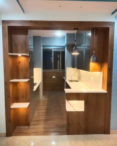 Narender Chauhan this side from Dezire Interiors.
We have our own manufacturing unit of Modular kitchen and wardrobe in sector 33 Gurugram.
Can i know your requirement ?
Contact. 7669900096
