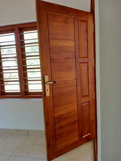 New work By carpenterOn.com
@perumbavoor
 #Home_Carpentry
#TeakWoodDoors 
 #woodenmaindoor 
#WoodenWindows 
#woodworks