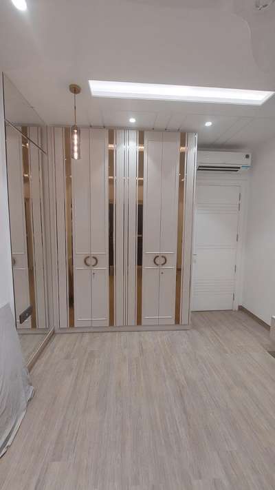 #almirah  # wardrobe  #modern  #colordeccor  #GOLDEN  #glass  #strips  #metal