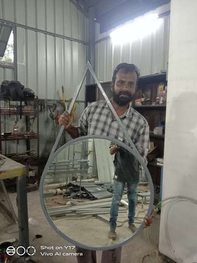 holding 
mirror frame