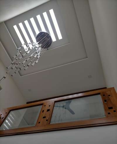' Providing sky light roofing  helps to bring more natural lights into our home and also enhances the ambience of  indoor space'
Completed Project@Vyttila.

#completed_house_construction #Architectural&Interior #skylight #doubleheightwalldesign #interiordesign