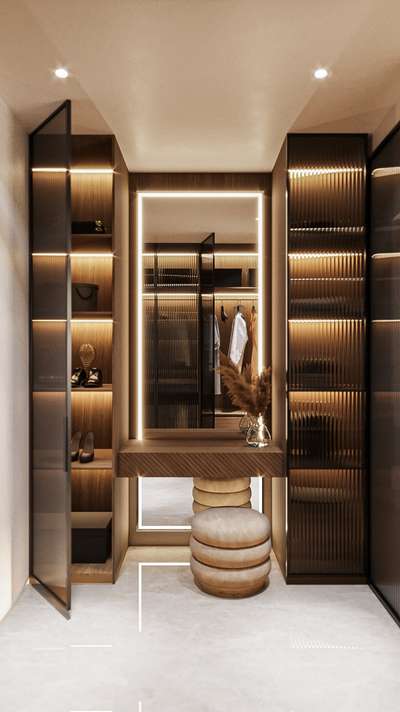 An elegant walk-in closet designed with a refined balance of luxury and functionality — featuring bespoke storage systems, seamless detailing, soft material palettes, and a spatial experience curated for comfort and sophistication. Currently ongoing at Perinthalmanna.

#Perinthalmanna #LuxuryResidence #WalkInCloset #InteriorDesign #LuxuryInteriors #ResidentialDesign #ContemporaryLuxury #VillaInteriors #ArchitectureAndInteriors #OngoingProject #KeralaHomes #LuxuryLiving #BespokeDesign #InteriorArchitecture #modernvilla