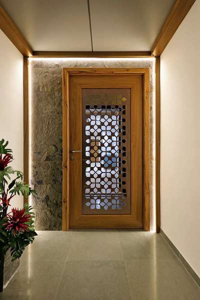 Main door entrance -design your house with AIC INTERIOR AND CONSTRUCTIONS with best quality service in delhi/ncr . Call us to know rates .