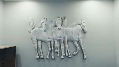 3 horses middle relief art work on the wall 
POP/fiberglass.