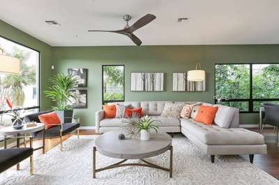 Get a natural look to your living room by adding shades of green. Use sofa, pots and rugs in grey shade to complement the green walls. The addition of orange accent pillows add just the right pop of colour to offset the green walls.
#interior #decor #ideas #home #interiordesign #indian #colourful #decorshopping
