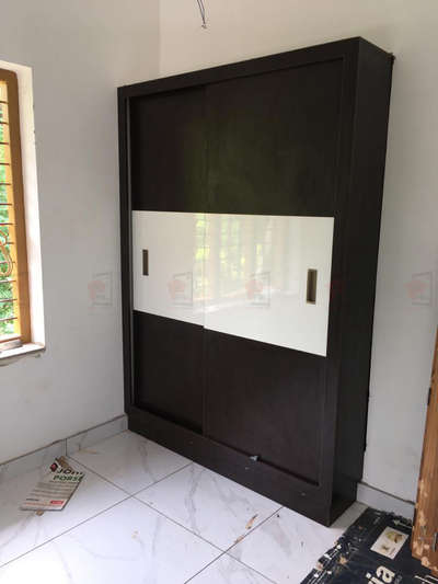 Sliding Door Wardrobe!!
kuranja nirakkil wardrobes cheythu kodukkunnu. contact for more details: 9947166882
 #WardrobeDesigns  #wardrobes  #WardrobeIdeas  #SlidingDoorWardrobe  #SlidingDoors  #2DoorWardrobe  #interiordesignkerala  #interiorfitouts