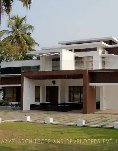 CONTEMPORARY RESIDENCE DESIGN
 #axyzbuilders  #axyzarchitects  #HouseDesigns  #veed  #HouseConstruction  #exterior_Work  #Architect  #architecturedesigns  #Architectural&Interior  #housedesigns🏡🏡  #ladyarchitect  #InteriorDesigner  #iritty  #Kannur  #Kasargod  #thaliparamba