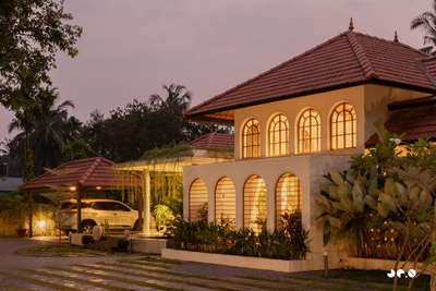 Arcade – Where arches, light, and landscape converse, and tradition finds a quiet 
contemporary soul.
Clients : @aarcha_vinod @ramvinodk 
Area: 4488 Sq.ft
Location: Bharanikavu, Kollam, Kerala.
Principal Architect/Designers: @ar.jun_v_a @_ar_anoop @ananthansurendran 
Interior Styling: Adheena Baburaj @dhii_design_studio 
Photography: @iksha.in #architecturedesigns  #KeralaStyleHouse  #TraditionalHouse  #interiordesignerkerala  #Architectural&Interior   #architectsinkerala