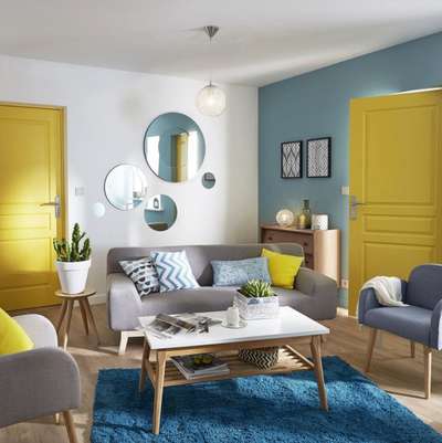 Go for this Retro inspired living room featuring bold colours. Introduce a few classic chairs, a retro-styled table, and possibly a vintage decor piece or two to accentuate the retro look. #interior #decor #ideas #home #interiordesign #indian #colourful #decorshopping
