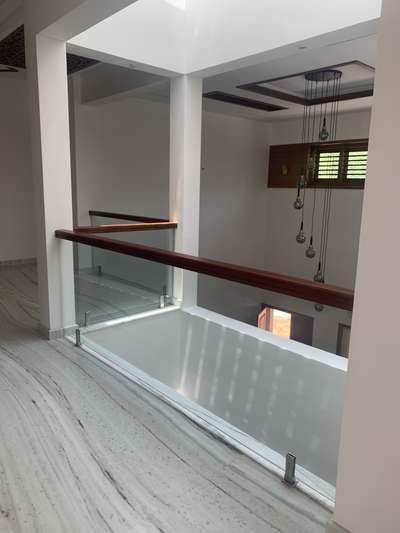 #calicutdesigners  #GlassStaircase  #Toughened_Glass  #KeralaStyleHouse