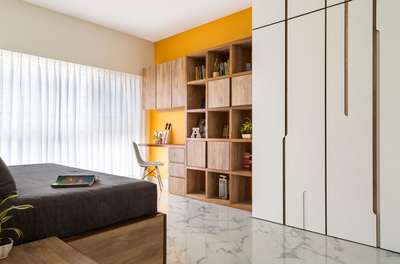 #InteriorDesigner  #apartmentdesign  #3bhkapartment #modularwardrobe #LShapeKitchen #furniture  
*How to reduce the interior cost of 3 BHK*

Multi-functional furniture saves money and space:-
Though space may not be a constraint in a 3 BHK apartment, too much furniture can make rooms appear cramped. It could also prove expensive to get more items. An amazing solution is to opt for multi-functional furniture. They are not only the trends of current times but they also make your rooms appear less cluttered. Since multi-purpose furniture is much more popular now, you will find umpteen versions. They also needn’t be expensive. 

A few examples you can try out are folding chaise lounge sofas, ottomans with storage, wall-mounted desks, cosy chairs with side shelves, coffee tables with storage and so on.
Www.kumbhinteriors.com