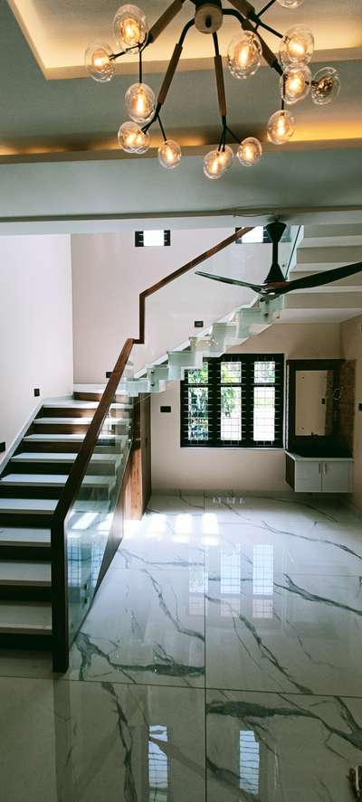 wood and glass #GlassHandRailStaircase
#premiumpots #StaircaseDecors #GlassStaircase