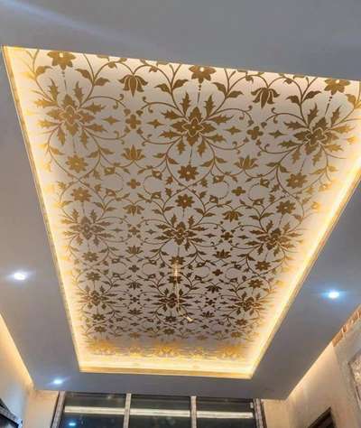 false ceiling with rajsthani golden views design. It's royal.