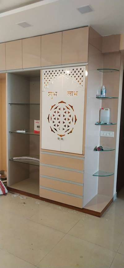 crockery unit with fridge space and temple with Corian sheet CNC cutting in 19 mm ply with laminate finish 1350/- sqft