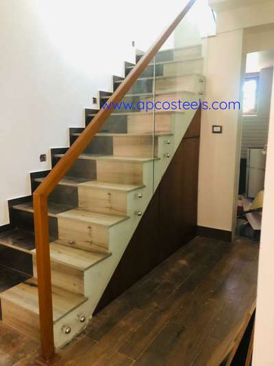 *glaas Handrails*
12 mm Toughned glass + mahagony wooden handrail we will provide our service all over keralajajjs