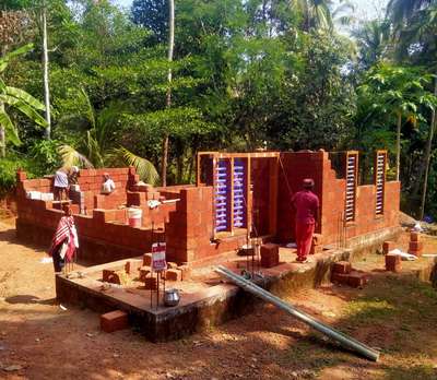 Ongoing residential work at Vailathur, Tirur

#newwork #exterior_Work #WoodenWindows #laterite #undercostruction🚧⚠️ #HouseDesigns #5centPlot #1500sqftHouse #ContemporaryHouse #30LakhHouse