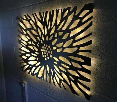 Laser cut metal art concept . Corten steel  backlight display in living room.