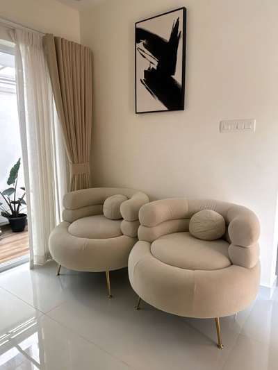 **Victorian Elegance Meets Modern Comfort**

Proud to unveil this sophisticated **3+1+1 Victorian-style sofa set**—a harmonious blend of classic charm and contemporary design. The plush circular armchairs and uniquely curved three-seater exude timeless luxury while offering unmatched comfort.

Crafted in a neutral beige palette with sleek golden legs, this set is the perfect statement piece for any modern living space, creating a serene and stylish ambiance. Ideal for those who value both aesthetics and functionality.

Materials Used:
✔Upholstery: Premium water-resistant bouclé fabric
✔Frame: Hardwood 
✔Cushioning: Dual-density high-resilience foam 
✔Legs: Polished Metal with Glossy anti-scratch finish  

Project Details:
🔹 Client: Aparna Kailas
🔹 Location: Kochi, India 
🔹 Completion Date: April 2025

 #sofa #sofaset #sofadesign #stylishsofa #customsofamaker  #luxurysofa #sofadesign #livingroomsofa