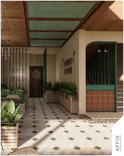 The outdoor dining area of Cafe is designed as a serene biophilic retreat, where a lush vertical green wall and rhythmic timber-paneled ceilings create an organic, immersive atmosphere. The space is anchored by a geometric diamond-tiled floor and a series of integrated wooden planter beds that define intimate seating pockets while maintaining an open, airy flow. Ambient Edison bulb pendant clusters and soft, natural textures like woven cane seating and patterned table tops further enhance the café’s modern yet rustic architectural identity. #Architect  #architecturedesigns  #Architectural&Interior  #architectsinkerala  #kerala_architecture  #best_architect  #cafedesign  #cafeseating