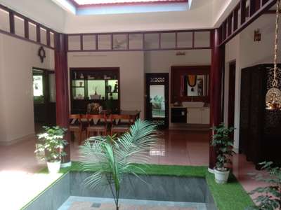 Courtyard and Dining
client : Mrs.Remya Sanjeevan
Location : Kannapuram
 #freesia interior
 #interiordesign