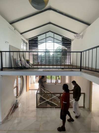 Attic space and double heights can always create an attractive interiors.

These are few details we have done in one of our residential project at Thrissur.

RCC slab has casted on lintel height which has converted to an attic space. This space can be used for library/ sitting space etc. according to our requirement. The industrial louvers & frame work is the main highlight of this space. Play of light and shadow is visible throughout the day.
.
.
 #residence #industrialdesign #atticspace #attic #louvers #gprofiles #glass #doubleheight #StaircaseDecors #KeralaStyleHouse #SlopingRoofHouse