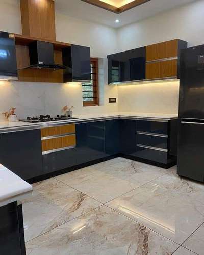 wooden & colour mica lamination finished kitchen   #KitchenIdeas  #LargeKitchen  #LShapeKitchen  #WoodenKitchen  #KitchenCabinet  #KitchenRenovation  #KitchenCeilingDesign  #KitchenTable  #ModularKitchen  #KitchenInterior  #OpenKitchnen