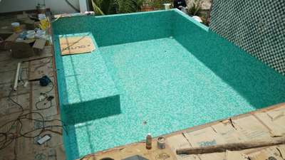 Roof top swimming pool for Mr.Shanfeer,tiling finished