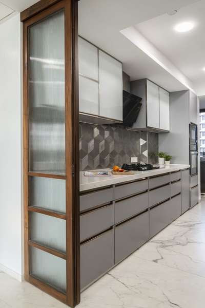 modular kitchen with sliding door 
for more contact us 
 #thedecorators  #HouseDesigns  #KitchenIdeas  #ModularKitchen  #LargeKitchen  #KitchenCabinet  #WoodenKitchen  #OpenKitchnen  #LShapeKitchen  #KitchenRenovation  #slidinggate  #SlidingDoors