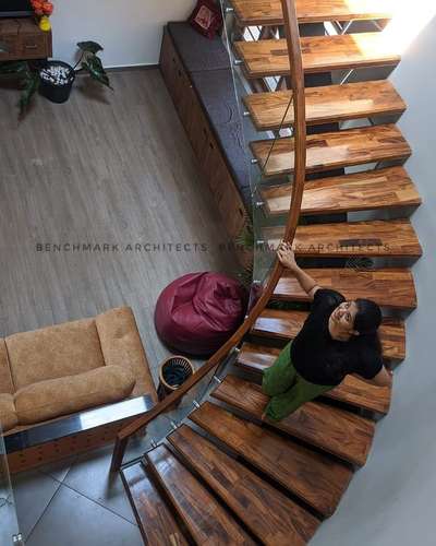 #StaircaseDecors #GlassStaircase #CurvedStaircase #curve #WoodenStaircase #ContemporaryHouse #HouseConstruction #contemporary #metalstaircase #metalstairs #StaircaseDesigns #Architectural&Interior #architecturalvisualization #InteriorDesigner #kannurinterior #Kannur #architectsinkerala