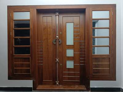 #maindoor  #DoubleDoor  #Teak  #teakwood  #FrontDoor  #sitout  #sitoutdesign  #wooddesign  #DoorDesigns  #GlassDoors  #FrenchWindows  #WoodenWindows  #TeakWoodDoors