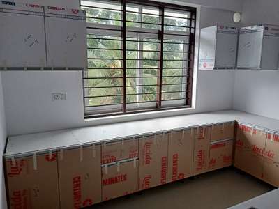 ongoing project at greenhill apartments thodupuzha
lamination kitchen