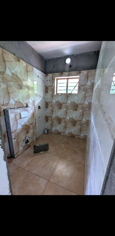 Tiling works at Ettumanoor site