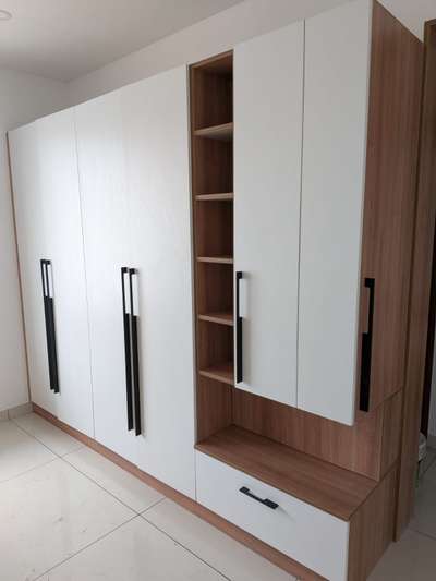 #InteriorDesigner #4DoorWardrobe #homeinteriors #kochiinteriors