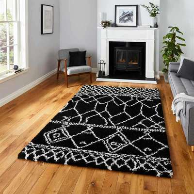 A simple trick for achieving an easy black and white look - black frames with white borders, a black and white rug and some black, white and gray cushions.
#interior #decor #ideas #home #interiordesign #indian #colourful 
#decorshopping