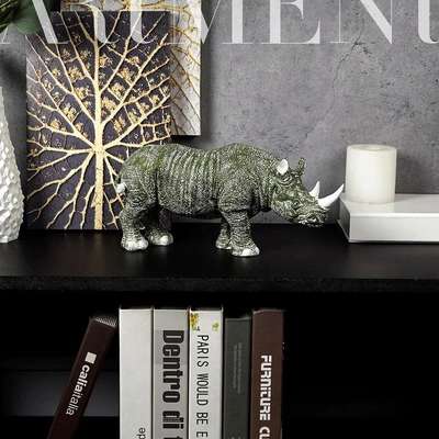 Manifesting the Strength of a Rhino!

The Golden-Horned Rhino Table Accent has a high-end feel, making it perfect for luxurious home decor.
Rhinos represent strength, sturdiness and resilience. Even in Feng Shui, rhinoceros is used for protection against enemies.

#homedecor #tabletop
#art #theartment #decorshopping