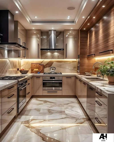 Rich warm tones embrace this modern kitchen where practicality meets style✨
The sleek chimney and easy-access handled storage create the perfect cooking sanctuary. 
A space that welcomes both culinary adventures and everyday moments.
 #KitchenIdeas #LargeKitchen #kitcheninteriors #ahorainteriors
