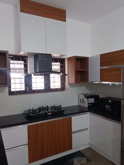 #KitchenCabinet 
#KitchenInterior 
#interiordesignkerala 
#HouseConstruction 
#homeinteriordesign 
#keralahomedesignz 
#_builders 
PINELO DESIGNS