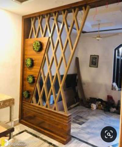 Bade drawing room ko divide karne ke liye yah design Pyara Hai ply board se Banaya Gaya Hai viniyar lagakar Banaya Gaya Hai