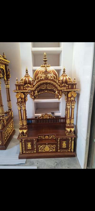 Premium wooden mandir beautifully adorned with intricate hand-applied gold leafing from GGLS, featuring traditional carvings, elegant pillars, and a rich royal finish—perfect for luxury home temples and sacred spaces. #goldleafing  #gilding  #goldleafartwork  #goldleafpainting