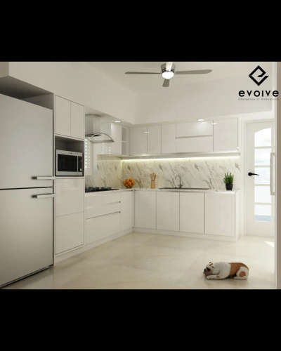 A contemporary minimalist kitchen design by Evolve Interiocrat seamlessly blends form and function 💗

The kitchen features a sleek, white color palette, integrated appliances, and luxurious marble accents. The L-shaped layout maximizes efficiency, while under-cabinet lighting adds warmth and highlights the marble's subtle veining 🪄


#luxuryliving
#interiordesignexcellence
#timelesselegance
#innovativedesign
#dreamhome
#interiorinspiration
#homedecor
#craftsmanship
#designgoals
#interiordecor
#homedesign
#creatingbeautifulspaces
#styleandsubstance
#highendliving
#masterpiece
#creativespaces
#modernluxury
#elegantinteriors