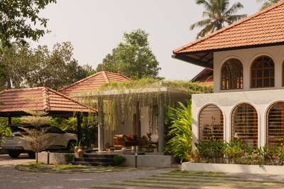 Arcade - Where arches, light, and landscape converse, and tradition finds a quiet contemporary soul.
Completed: 2025 
Area: 4488 Sq.ft
#ContemporaryHouse #colonialarchitecture #colonial_style #arch #keralaarchitectures