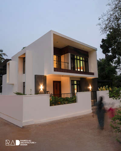 A bold form wrapped in calm minimalism, where light, texture, and proportion create a timeless home.

#modernhome #minimalarchitecture #contemporarydesign #keralahomes #rameesali