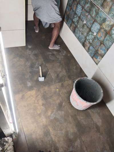 Toilet  floor tile work at Eranakulam