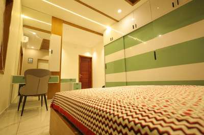 #Kannur #Interlocks #rooms #thalasseryinteriors #MasterBedroom #SlidingDoorWardrobe #DressingTable