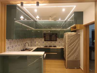 #wpckitchen 
#acryliclamintes 
#ModularKitchen 
#OpenKitchnen 
#breakfastcounter 
#LivingRoomTVCabinet 
#buildersinkollam 
#contractorsinkerala 
PINELO DESIGNS