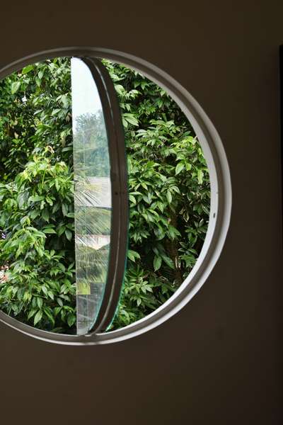 #roundwindow
 #outdoorplant
 #modernminimalism