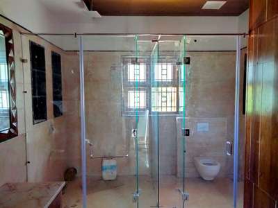 A new model bathroom partition with towel stand. #BathroomIdeas   #toughenedglasspartition