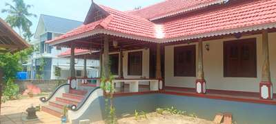 #TraditionalHouse  #nalukettveddu  #Nalukettu  #nadumuttam  #varandha  #pillerdesign  #RoofingDesigns  #tilefront  #DoorDesigns